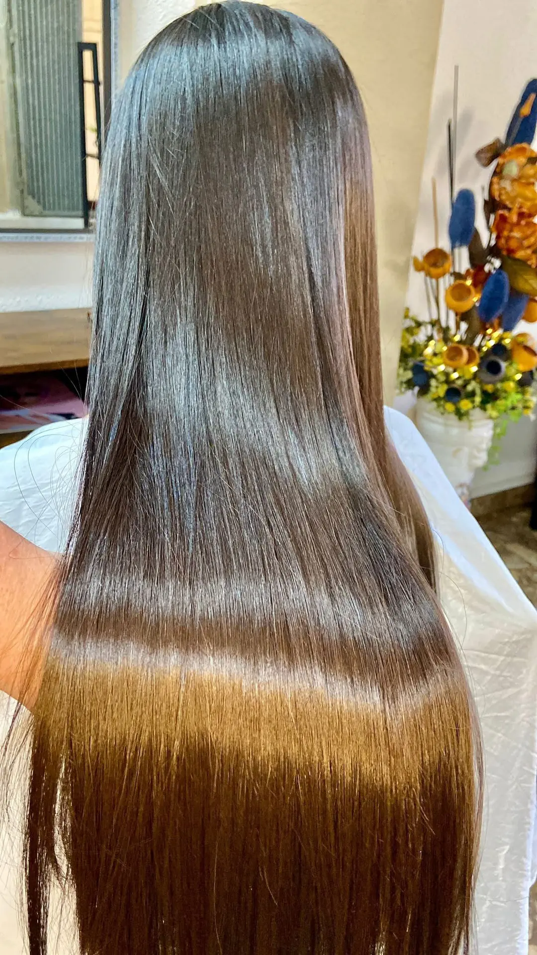 Cabello largo con tratamiento de keratina y brillo intenso